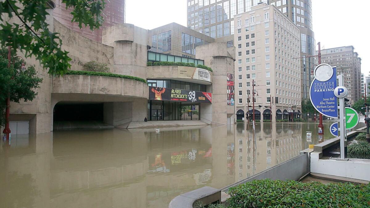 Flooding in Houston's Theater District caused by tropical storm Harvey. As Houston's cultural institutions assess the damage, some have temporarily closed or cancelled performances.