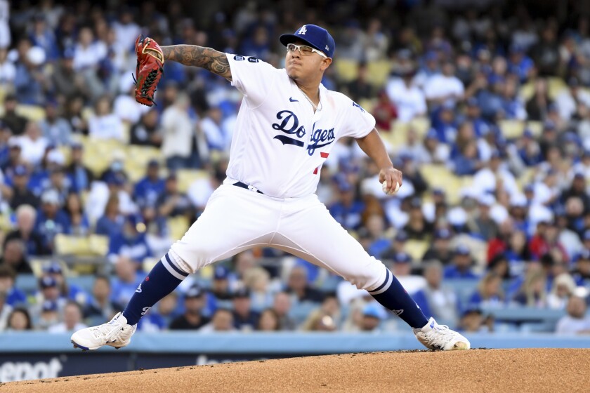 Dodgers pitcher Julio Urías delivers a pitch during Game 4 of the NLCS against the Atlanta Braves.