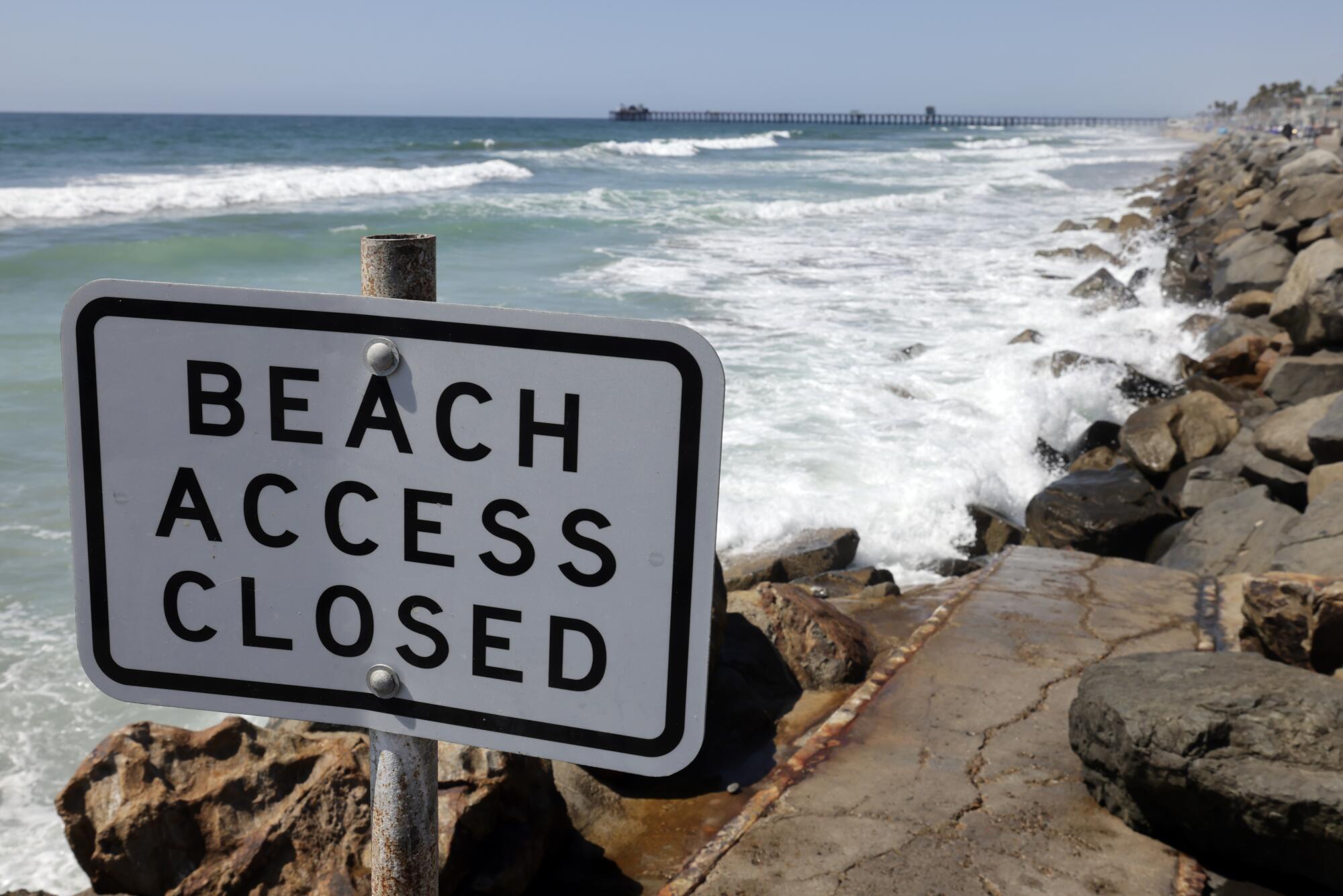 A ramp to the beach is closed at the southern end of the Strand in Oceanside.