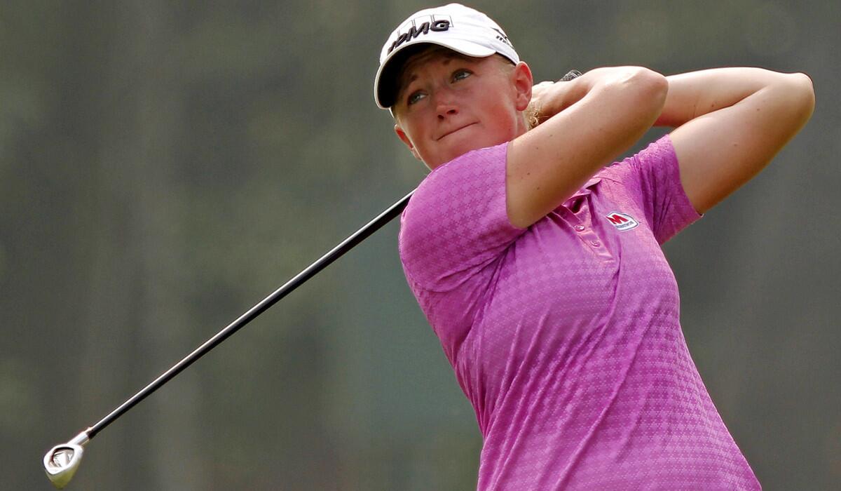Stacy Lewis watches her approach shot at No. 4 on Thursday during the first round of the Sime Darby LPGA Malaysia.