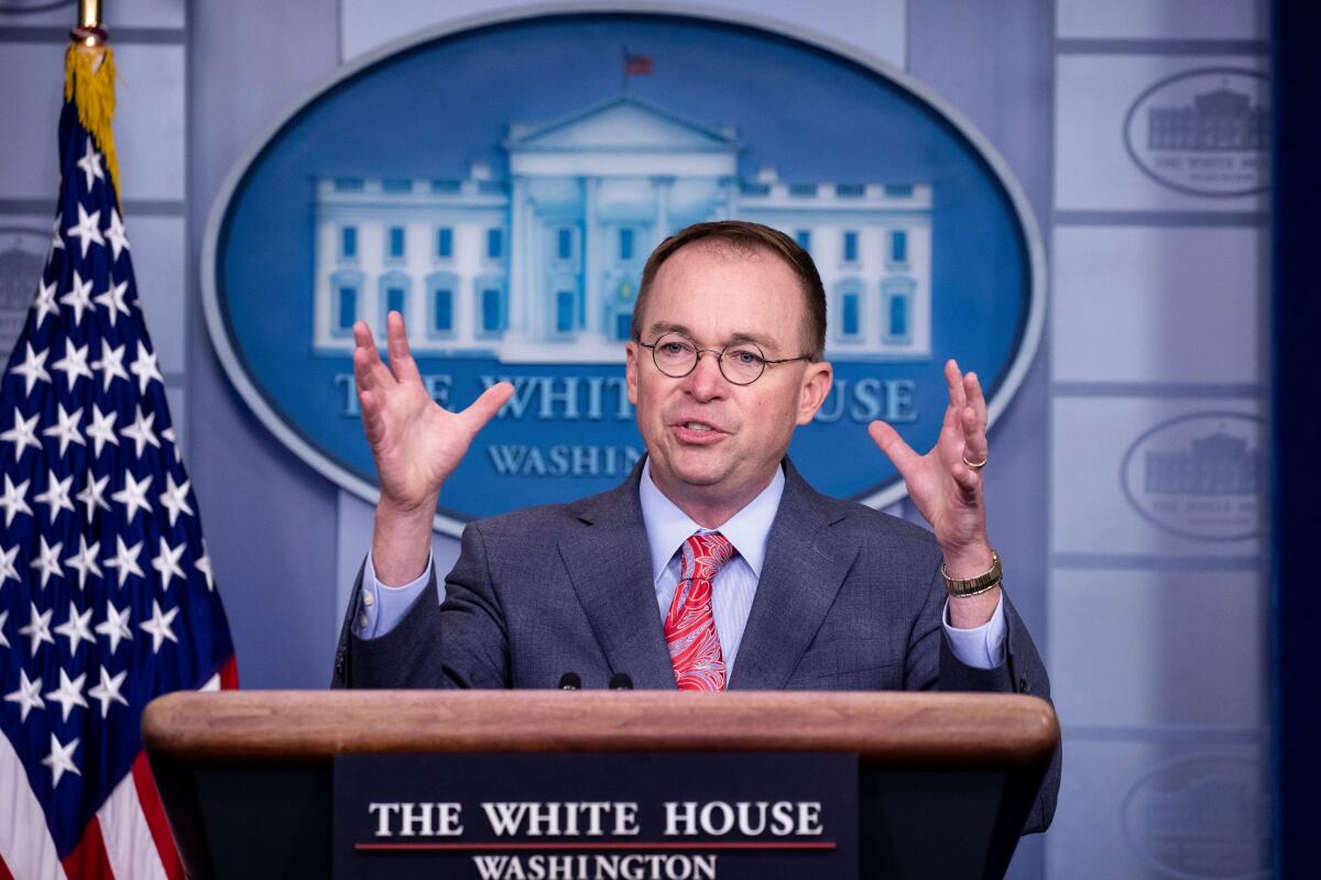 Acting White House Chief of Staff Mick Mulvaney holds a news conference