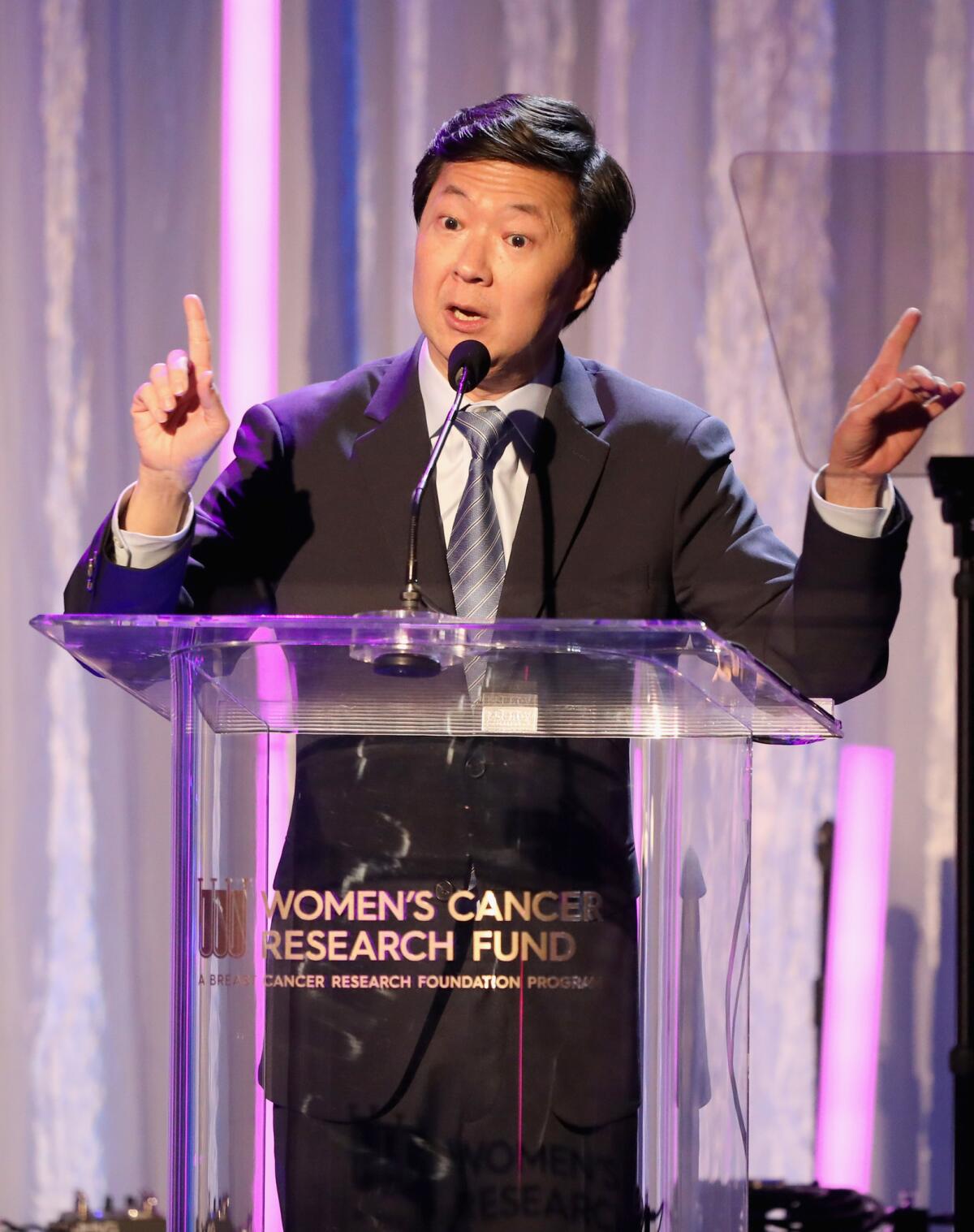 Actor Ken Jeong, who once had a medical career, speaks onstage during WCRF's An Unforgettable Evening event.