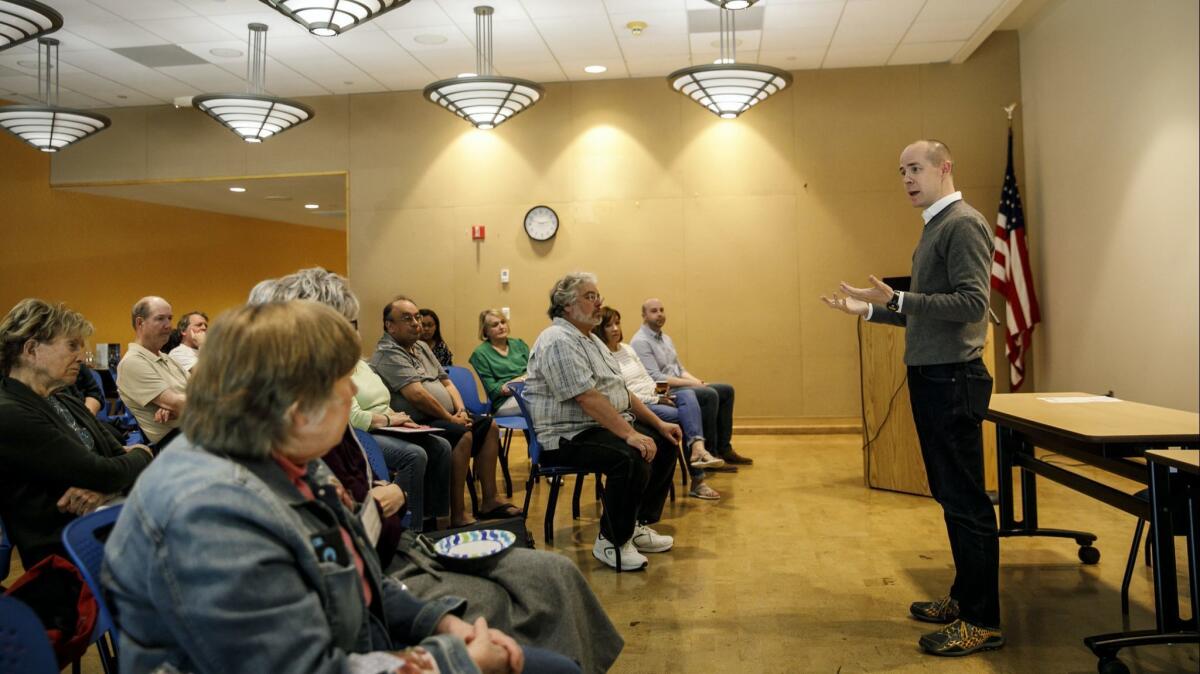 Rusty Hicks speaks at a meeting of Palos Verdes Democrats in Rolling Hills Estates on March 17.