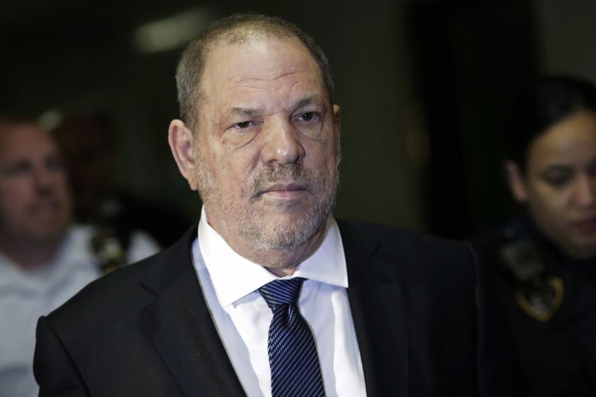 FILE - In this Oct. 11, 2018 file photo, Harvey Weinstein enters State Supreme Court in New York. Lawyers for Weinstein say they?ve uncovered new evidence that further undermines rape allegations against him. The lawyers said Friday, Dec. 7 in a letter to the New York City judge overseeing Weinstein?s criminal case that a friend of the alleged victim has said the two attended a movie screening hosted by the former film mogul hours after prosecutors say the attack took place in 2013. (AP Photo/Mark Lennihan, File)