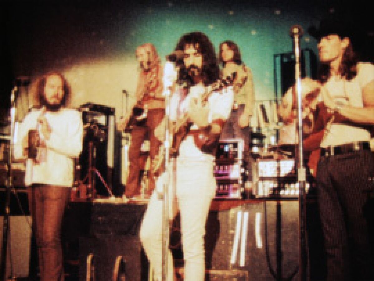 Frank Zappa, center, is shown performing with The Mothers of Invention