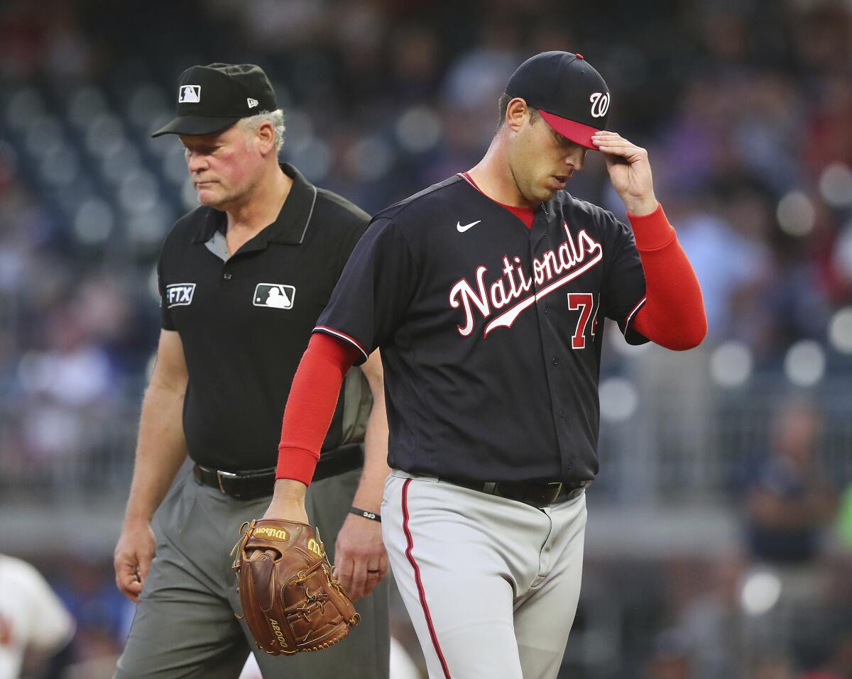 Washington Nationals starting pitcher Sean Nolin is ejected after hitting Atlanta Braves' Freddie Freeman with a pitch during the first inning of a baseball game Wednesday, Sept 8, 2021, in Atlanta. (Curtis Compton/Atlanta Journal-Constitution via AP)