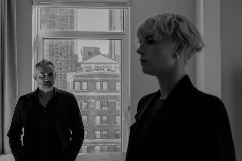 NEW YORK, NY 04/30/2022: Alex Garland and Jessie Buckley pose for a portrait at The Four Seasons hotel suite in Manhattan, NY on April 30th, 2022. Garland is an English writer and filmmaker who wrote and directed the upcoming horror film Men which stars Jessie Buckley and Rory Kinnear. (Danielle Amy / For The Times)