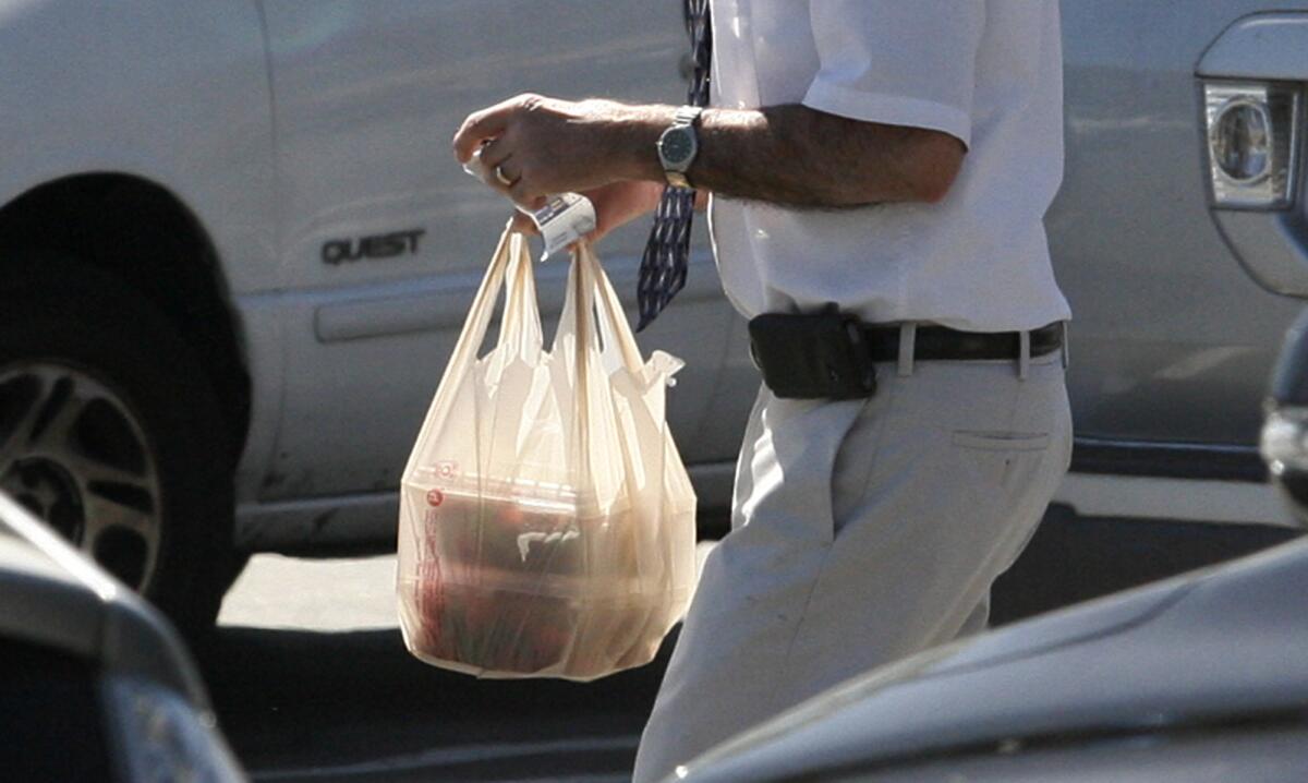 Plastic bags are not banned in La Cañada Flintridge, though the local Ralphs store, pictured on Tuesday, April 16, 2013, is no longer offering them to customers.