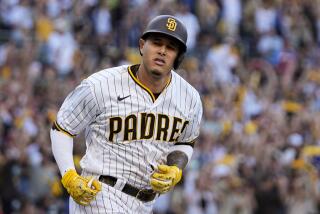San Diego Padres' Manny Machado celebrates his home run during the seventh inning in Game 2 of the baseball NL Championship Series between the San Diego Padres and the Philadelphia Phillies on Wednesday, Oct. 19, 2022, in San Diego. (AP Photo/Brynn Anderson)