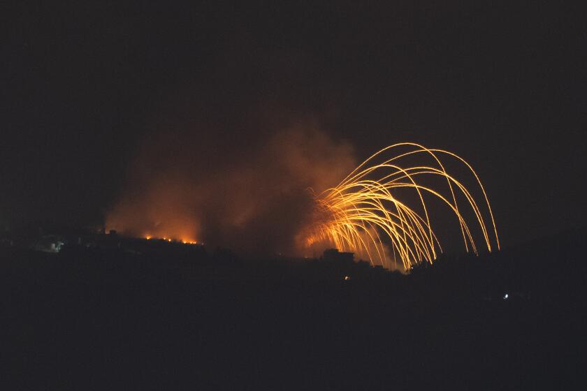 Israeli shelling hit an area in southern Lebanon as seen from northern Israel, Monday, Sept. 30, 2024. (AP Photo/Leo Correa)