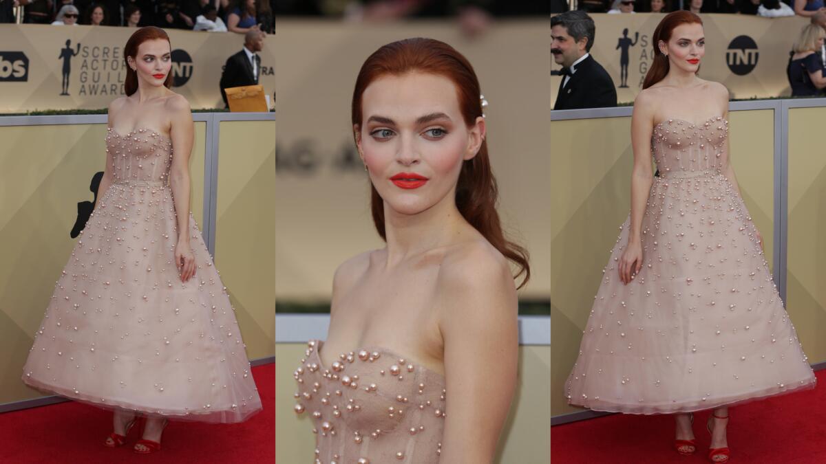 Madeline Brewer of "The Handmaid's Tale" is on trend at the SAG Awards red carpet with a soft pink dress. It's one of our favorite looks.