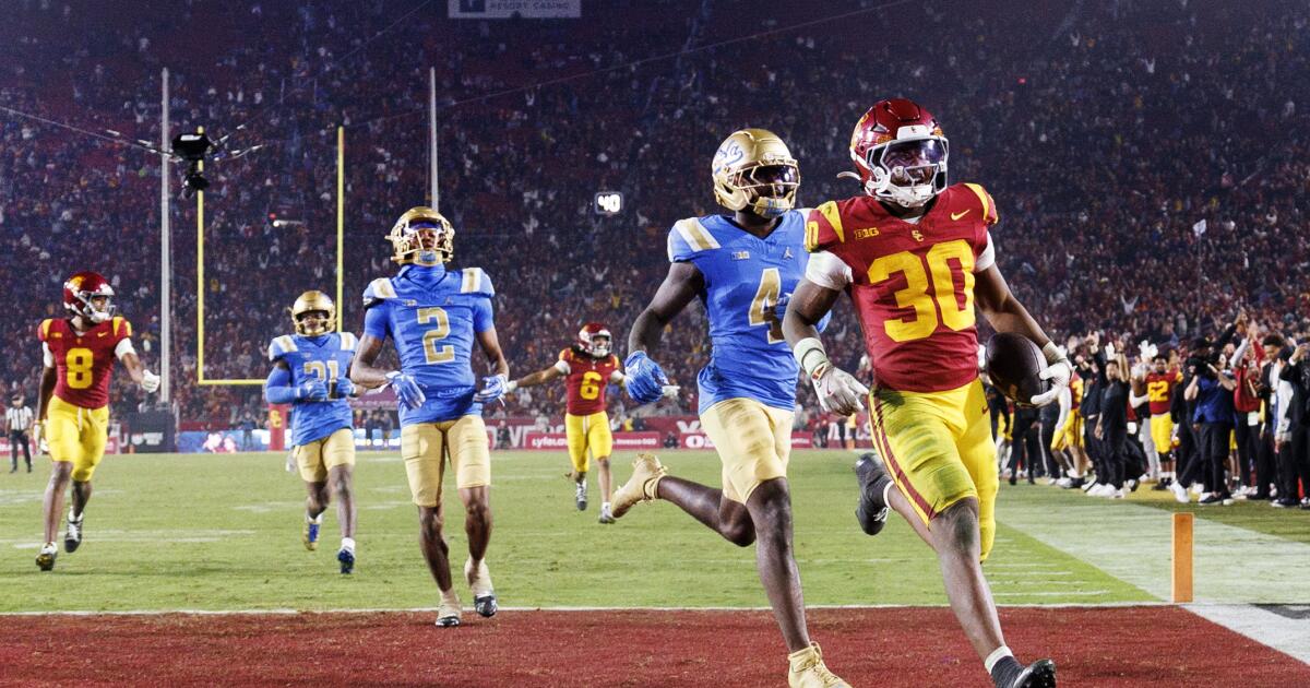 No. 17 USC knocks out scrappy UCLA, clinches nine-win season No. 17 USC knocks out scrappy UCLA, clinches nine-win season