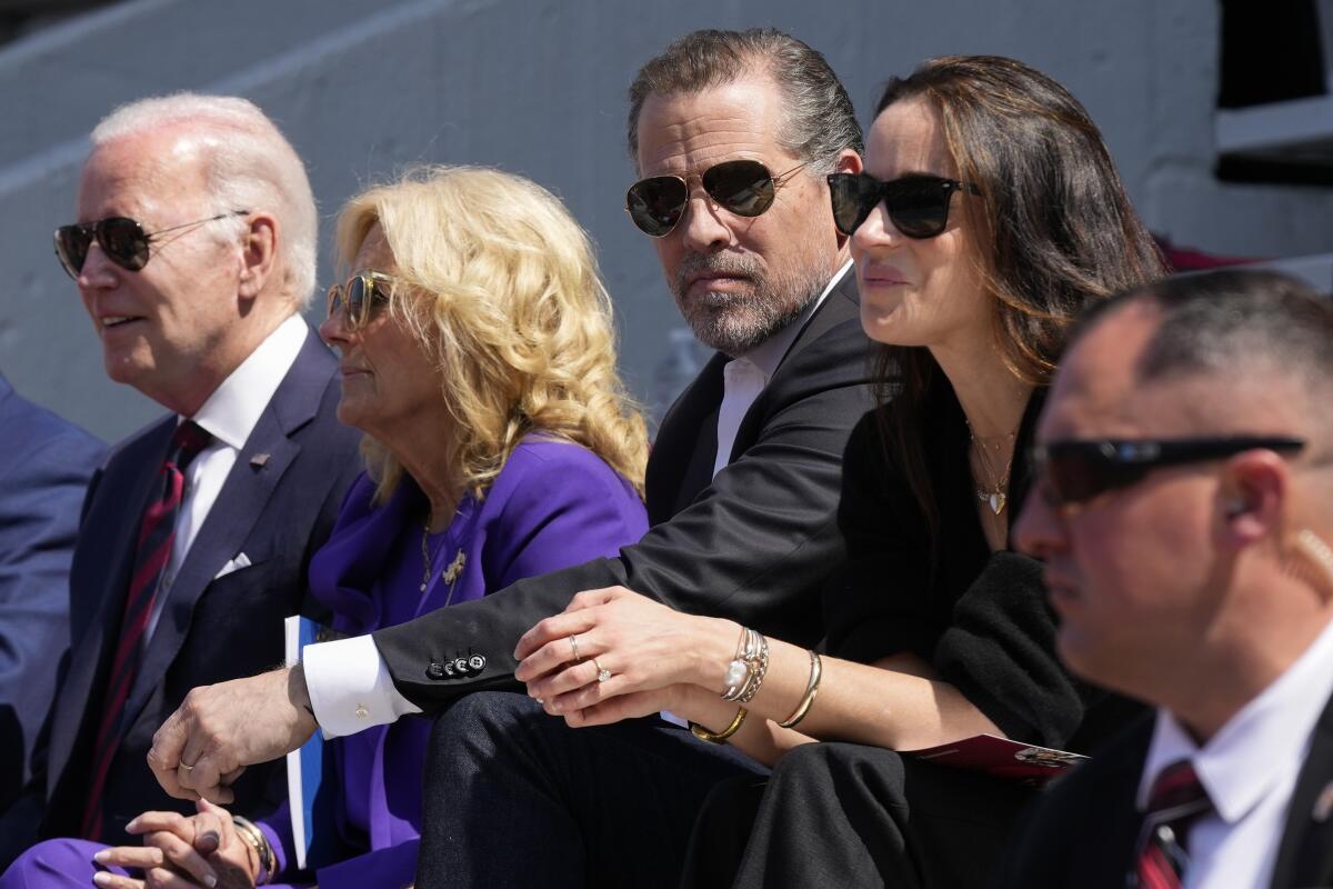 Hunter Biden flanked by his parents and sister.