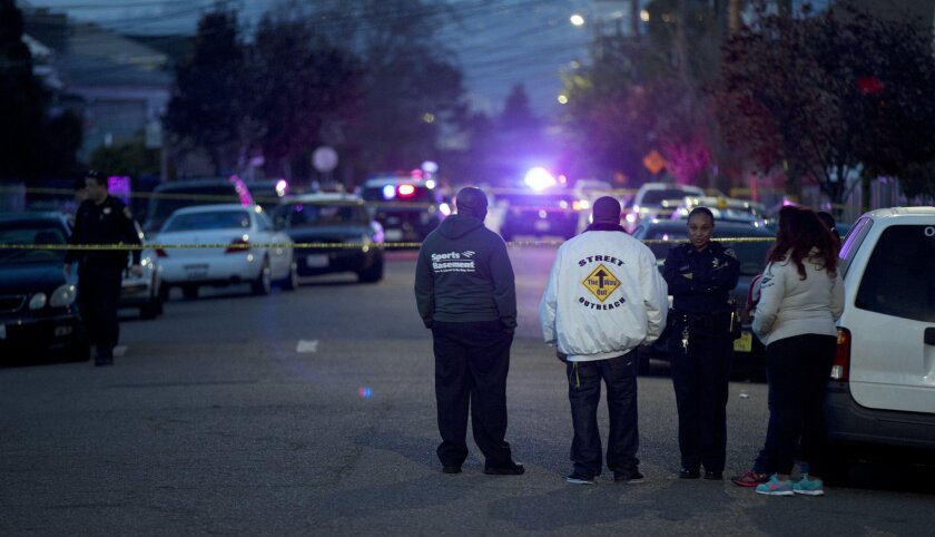 Police are investigating a fatal shooting in Oakland after a woman was killed and two other people were critically injured.