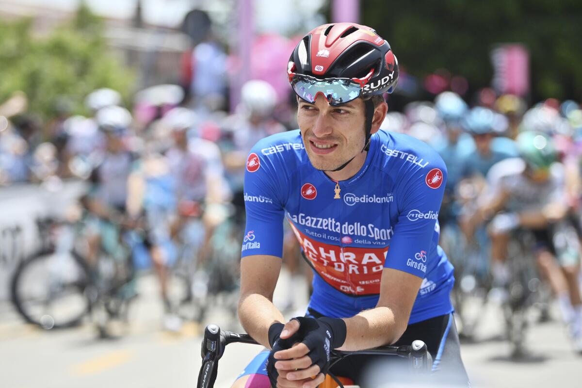 Gino Mader waits for the start of the 7th stage of the Giro d'Italia, Tour of Italy cycling race, in Notaresco, Italy, on May 14, 2021. Swiss cyclist Gino Mader has died Friday, June 16, 2023 one day after suffering injuries when he crashed off the road down a ravine during a descent at the Tour de Suisse. (Massimo Paolone/LaPresse via AP)