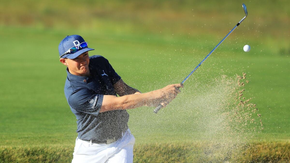 Scott Gregory plays his second shot from the bunker on the second hole during the first round of the U.S. Open at Shinnecock Hills Golf Club.