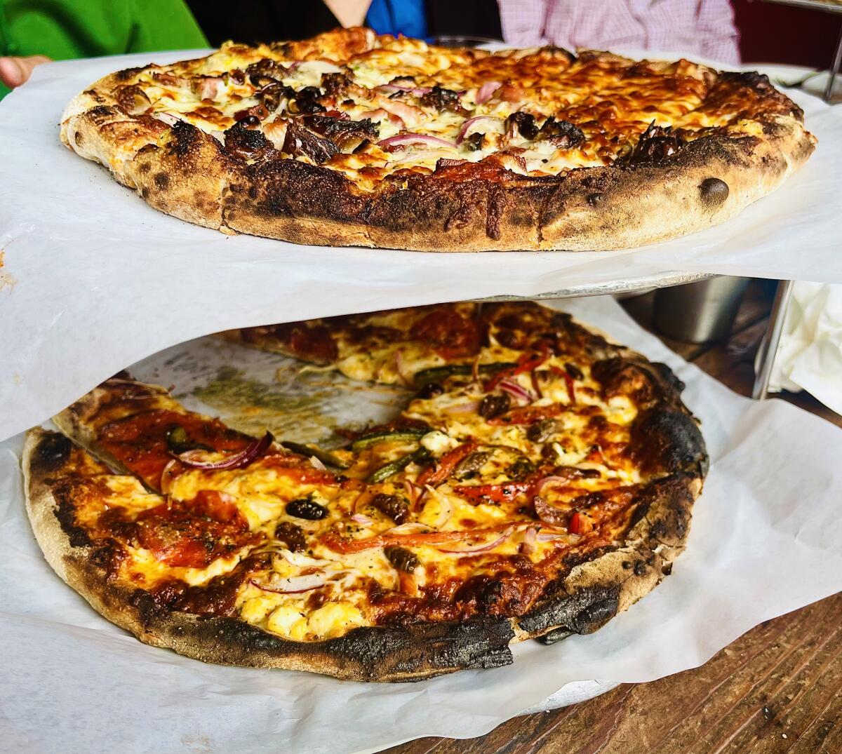 A double-decker serving of some of the flatbreads at Full of Life Flatbread.