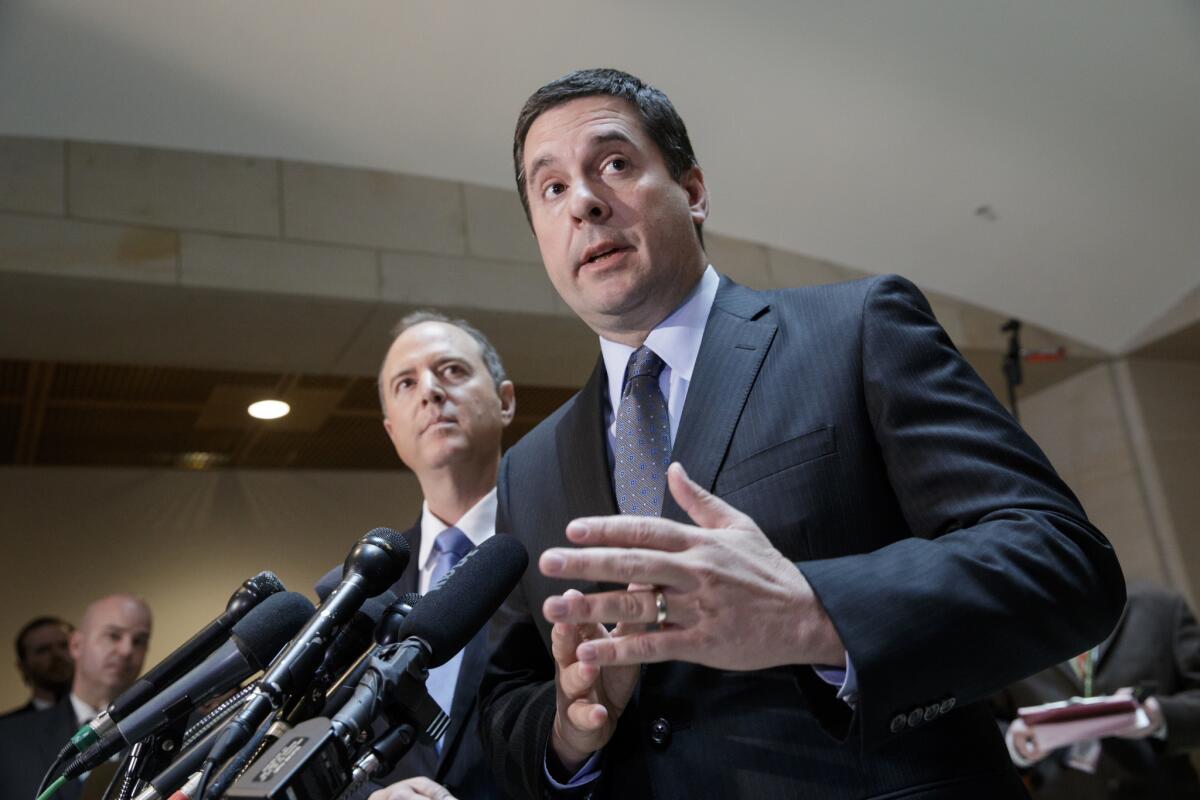 House Intelligence Committee Chairman Rep. Devin Nunes, R-Calif., right, accompanied by the committee's ranking member, Rep. Adam Schiff, D-Calif., talks to reporters, on Capitol Hill in Washington on March, 15, 2017, about their investigation of Russian influence on the American presidential election.