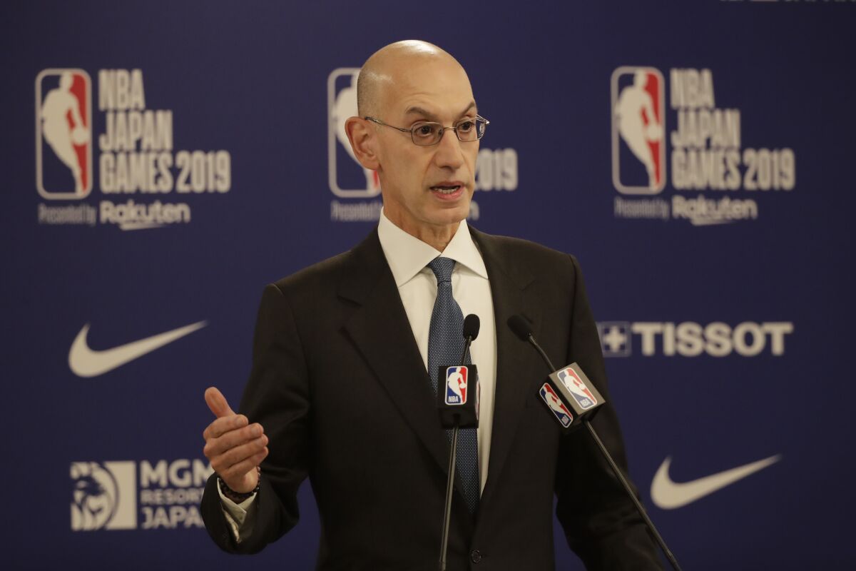 NBA Commissioner Adam Silver speaks at a news conference.