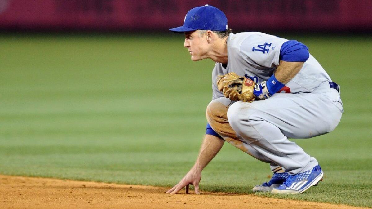 Dodgers second baseman Chase Utley keeps an eye on a baserunner at Angel Stadium during a game on May 16.