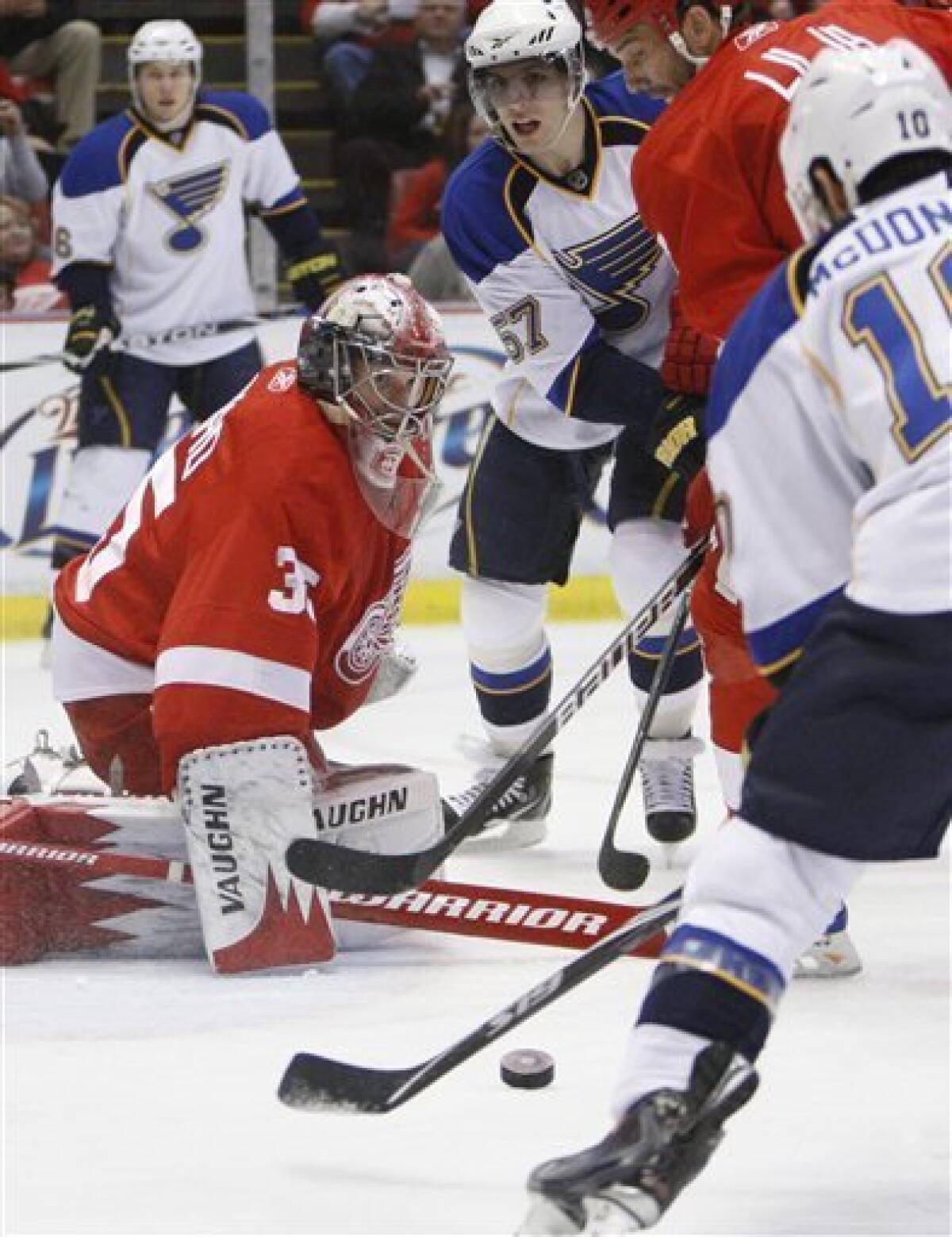 Detroit Red Wings goalie Chris Osgood skates during warm ups at