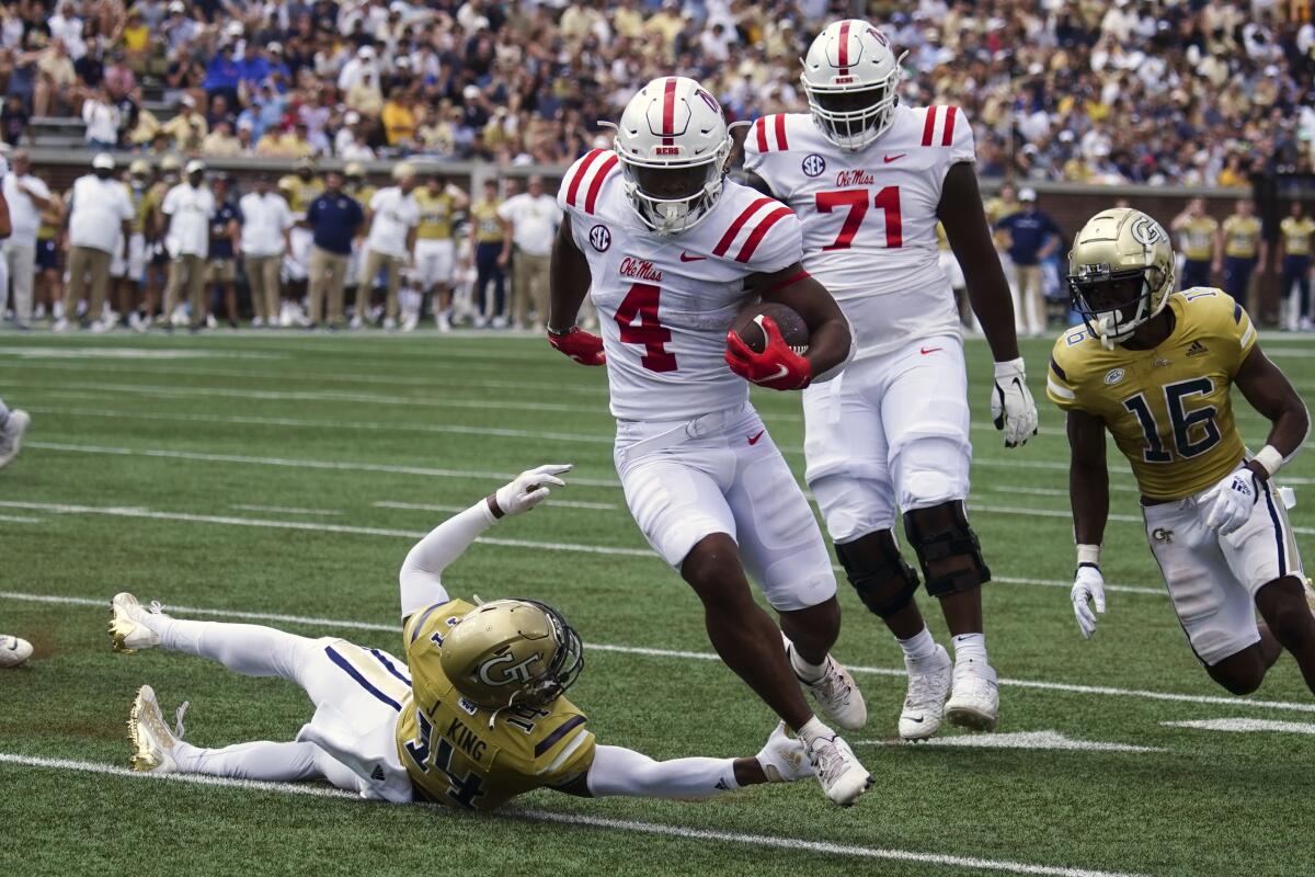 BYU shows off new football uniforms; adds Ole Miss series