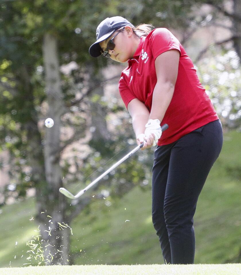 Burroughs Kiara Hernandez chips onto the tenth green in the Magnolia Park Optimist Club Girls High School Golf Tournament at De Bell Golf Club in Burbank on Thursday, October 4, 2018. Girls golf teams from all over Southern California competed