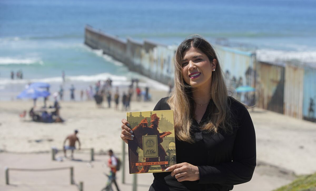 Marinee Zavala, a Tijuana journalist, poses with her new book