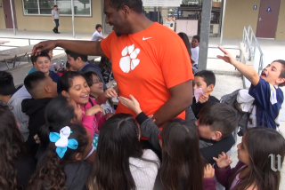 LA Chargers OL Chris Hairston visits San Diego elementary school