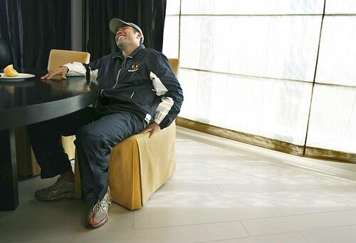 Oscar De La Hoya relaxes while eating a grapefruit during breakfast in his suite at the MGM Grand Hotel in Las Vegas.