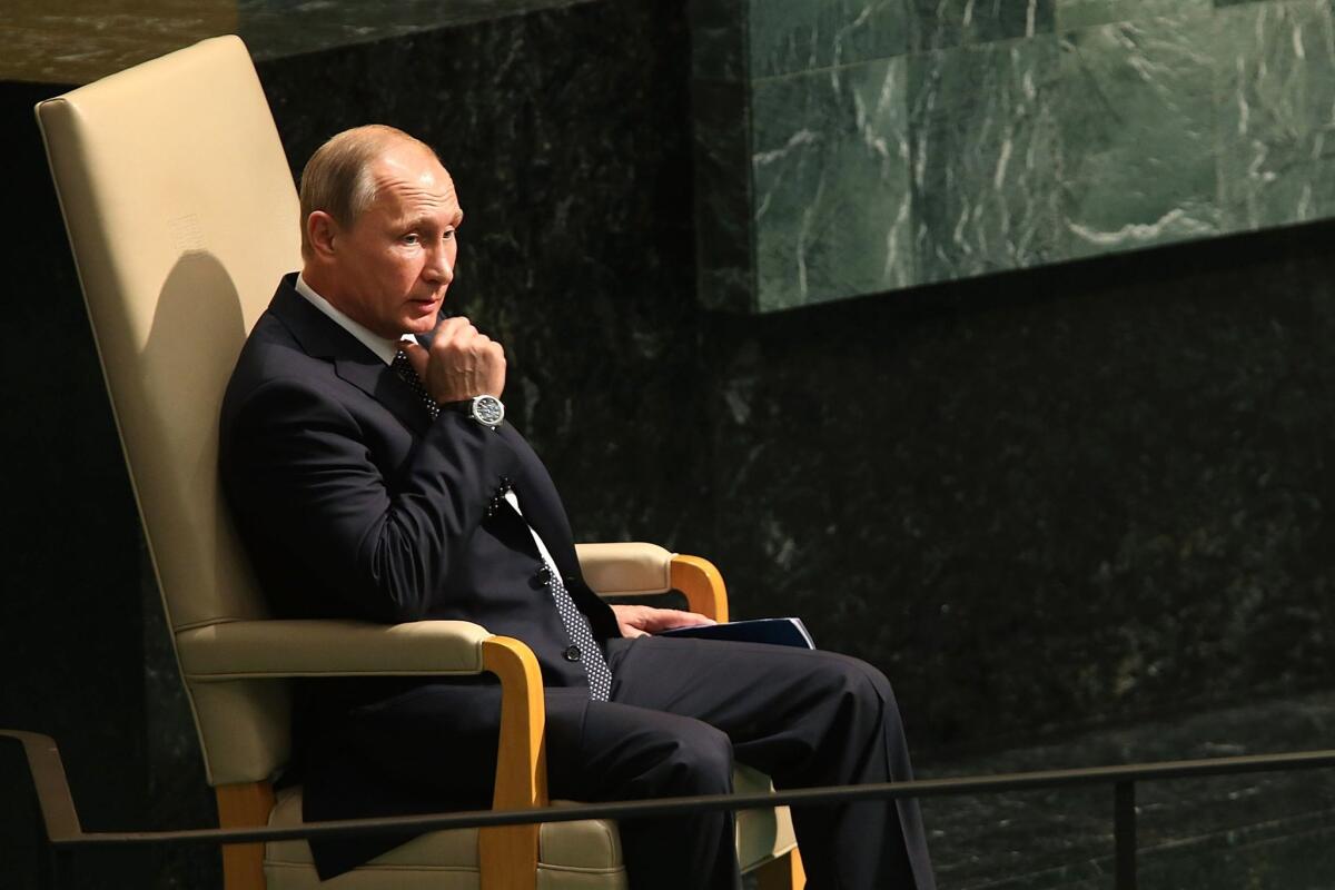 Russian President Vladimir Putin sits before speaking at the United Nations General Assembly at U.N. headquarters.