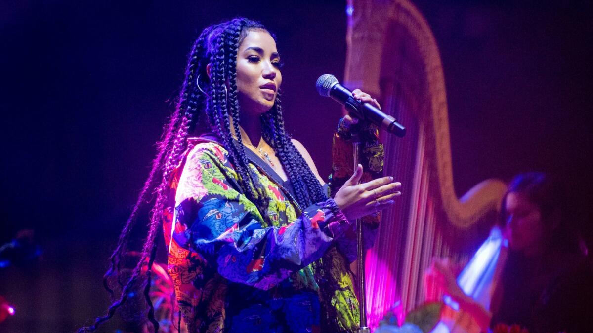 Jhené Aiko performs Saturday night at the All My Friends music festival in Los Angeles.