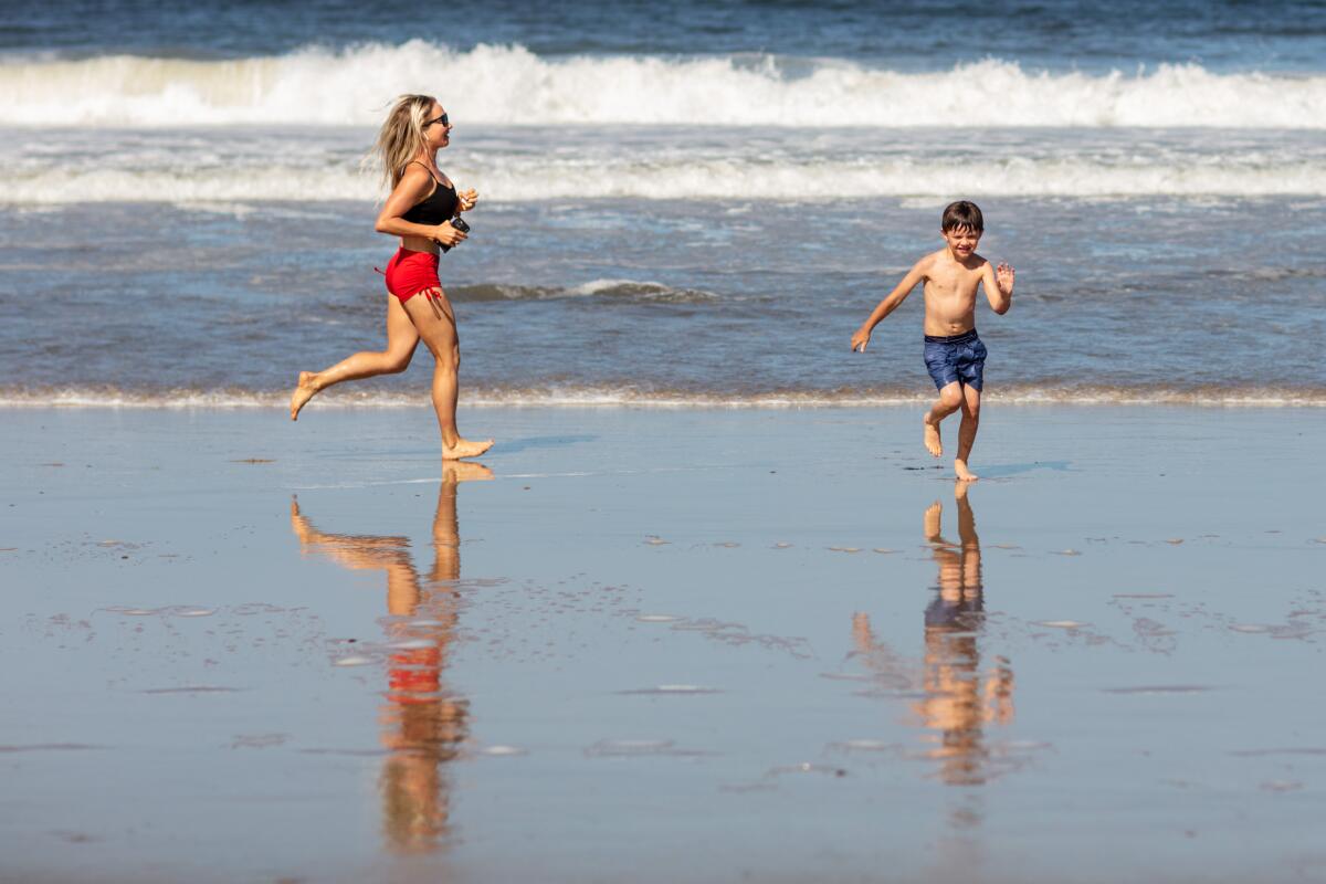 Los Angeles County beaches reopened on Wednesday, but only for those who keep moving.