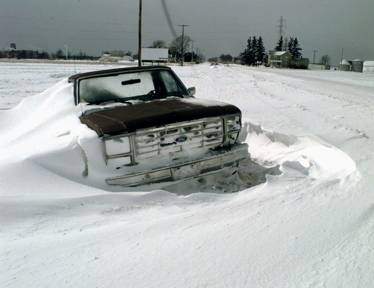 In an image reminiscent of Ervin Krause's short story "The Quick and the Dead," a truck sits abandoned in a snowdrift west of South Bend, Ind., after a 1998 storm. Krause is one of the writers portrayed in a new multimedia project and e-book, "Lost Writers of the Plains."