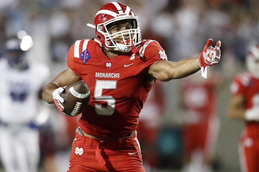 SANTA ANA, CALIF. - SEP. 21, 2018. Mater Dei receiver Bru McCoy signals a first down after making a catch against IMG in the first quarter Friday, Sept. 21, 2018, at Santa Ana Stadium. (Luis Sinco/Los Angeles Times)