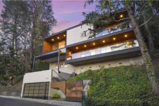 The three-bedroom house is perched in Lake Hollywood, a small enclave of homes overlooking the Hollywood Reservoir.