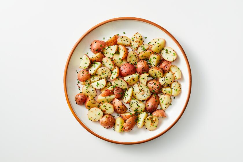LOS ANGELES - THURSDAY, July 25, 2019: Nigella Seed Potato Salad. Food Stylist by Genevieve Ko / Julie Giuffrida and propped by Nidia Cueva at Proplink Tabletop Studio in downtown Los Angeles on Thursday, July 25, 2019. (Leslie Grow / For the Times)