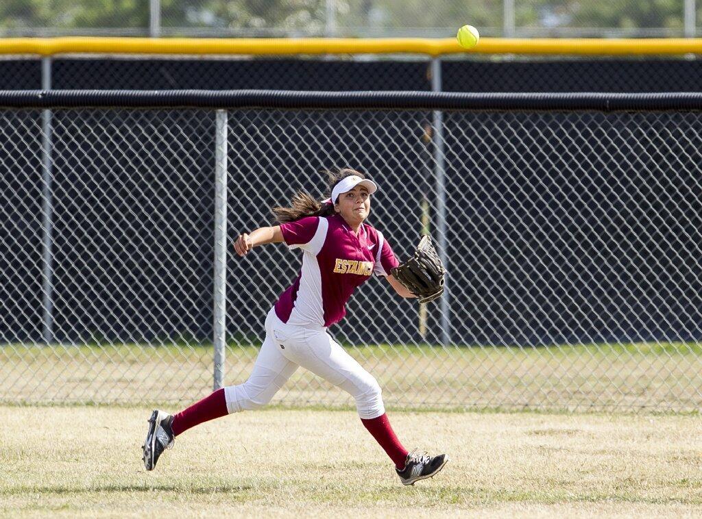 Estancia High's Hannah Almendarez attempts to track down a ball during a game against Godinez in an Orange Coast League game on Tuesday.