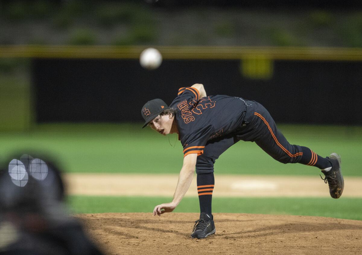 Huntington Beach's Shane Stafford pitches during the Newport Elks Tournament Frank Lerner Division title game against JSerra at Orange County Great Park in Irvine on Friday.