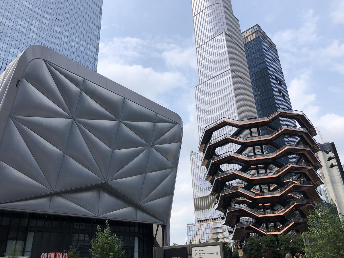 The facade of the Shed and the basket form of the Vessel are seen against a series of luxury towers