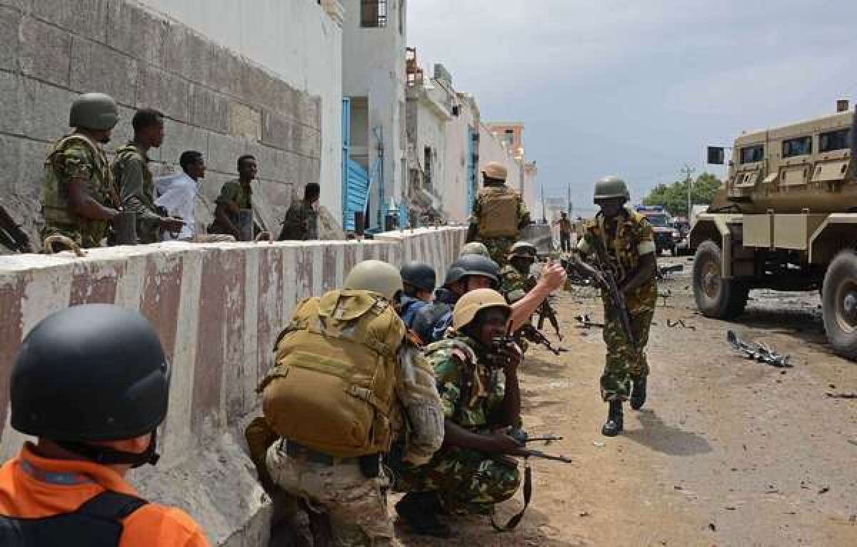 An African Union force in Somalia reacts after Al Qaeda-linked insurgents attacked a United Nations compound in Mogadishu.