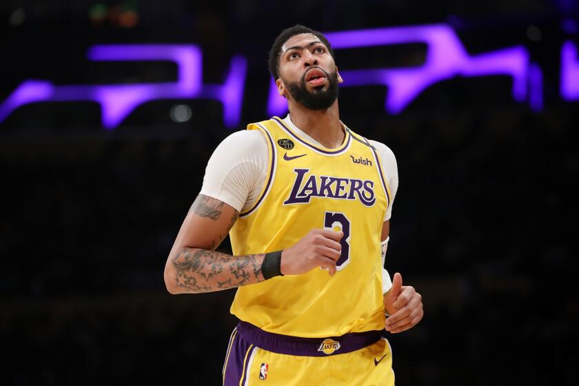 LOS ANGELES, CALIFORNIA - MARCH 03: Anthony Davis #3 of the Los Angeles Lakers runs on the court in a game against the Philadelphia 76ers during the second half at Staples Center on March 03, 2020 in Los Angeles, California. NOTE TO USER: User expressly acknowledges and agrees that, by downloading and or using this Photograph, user is consenting to the terms and conditions of the Getty Images License Agreement. (Photo by Katelyn Mulcahy/Getty Images)