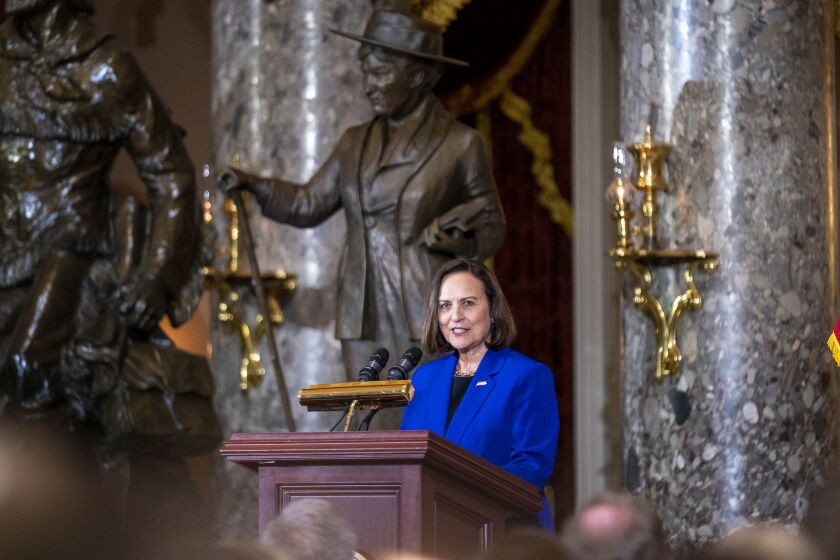Sen. Deb Fischer, R-Neb., speaks during an unveiling ceremony for the Congressional statue of Willa Cather, in Statuary Hall on Capitol Hill in Washington, Wednesday, June 7, 2023. Willa Cather was one of the country's most beloved authors, writing about the Great Plains and the spirit of America. (AP Photo/Andrew Harnik)