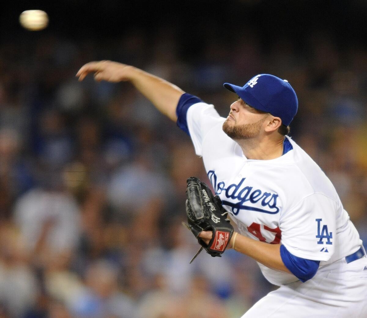 Dodgers starter Ricky Nolasco delivers a pitch during Friday's 2-0 victory over the Boston Red Sox.
