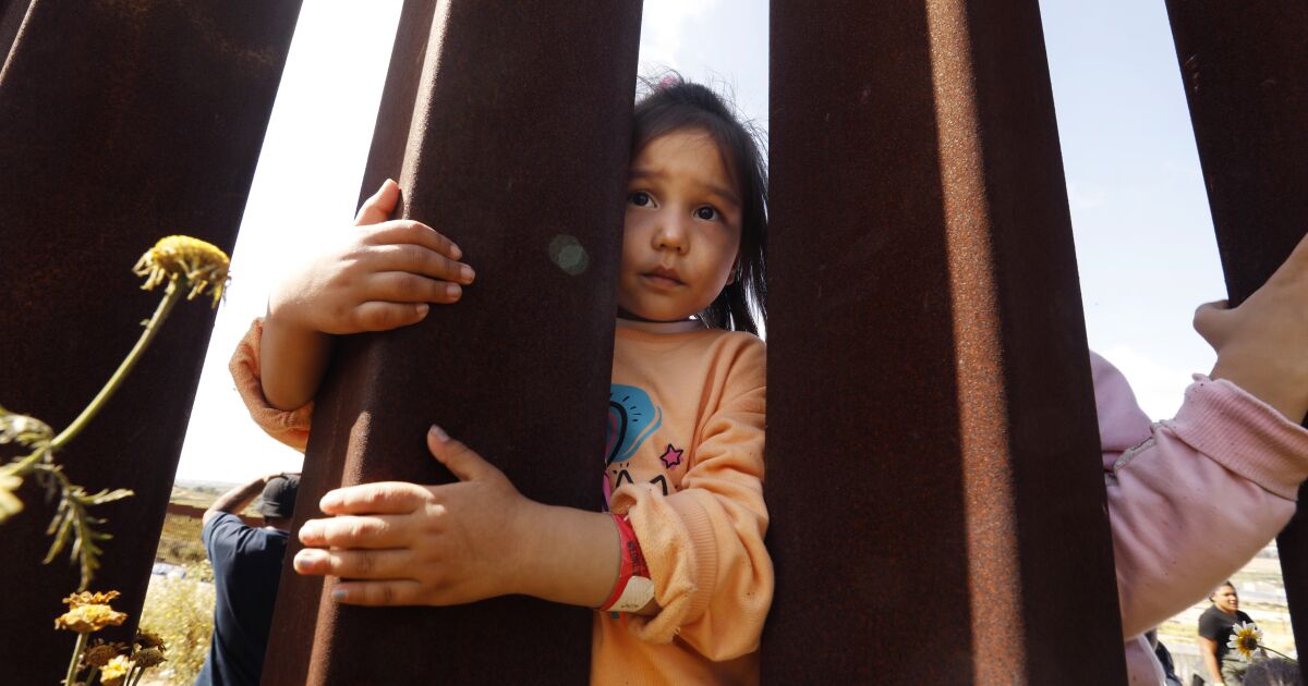 Photos: Migrants mass along the border as Title 42 nears expiration Photos: Migrants mass along the border as Title 42 nears expiration