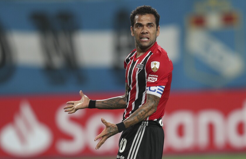 Daniel Alves of Brazil's Sao Paulo gestures during a Copa Libertadores soccer match against Peru's Sporting Cristal at the National Stadium in Lima, Peru, Tuesday, April 20, 2021. (AP Photo/Martin Mejia, Pool)