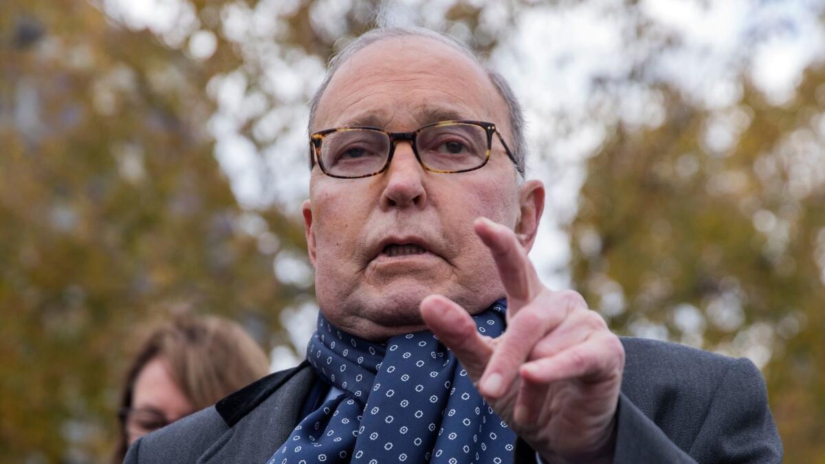 Larry Kudlow, director of the National Economic Council, talks to reporters outside the White House on Nov. 20.