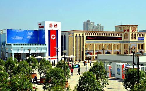 Visitors arrive at the North Korea pavilion, at left, and the adjacent Iran pavilion at the 2010 Shanghai Expo. It is the first time that North Korea has participated at a World Expo. The Expo officially opened May 1, 2010, and organizers expect the six-month-long event to attract close to 70 million people.