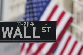 FILE - A Wall Street sign hangs in front of the New York Stock Exchange in New York, on June 14, 2022. Stocks are opening higher on Wall Street Wednesday, Aug. 3. (AP Photo/Seth Wenig, File)