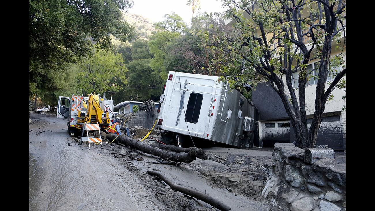 Photo Gallery: Mudslide clean up on Country Club Drive